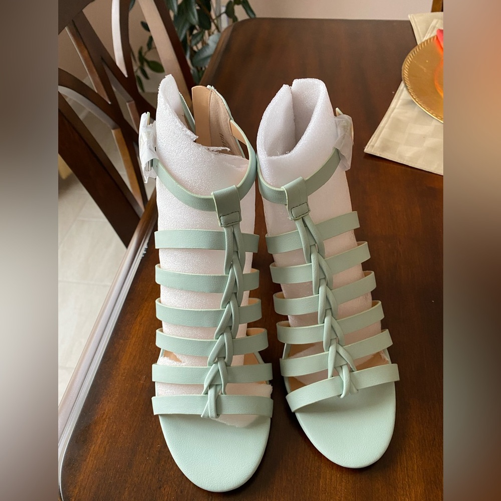 High heels sandals by XOXO .